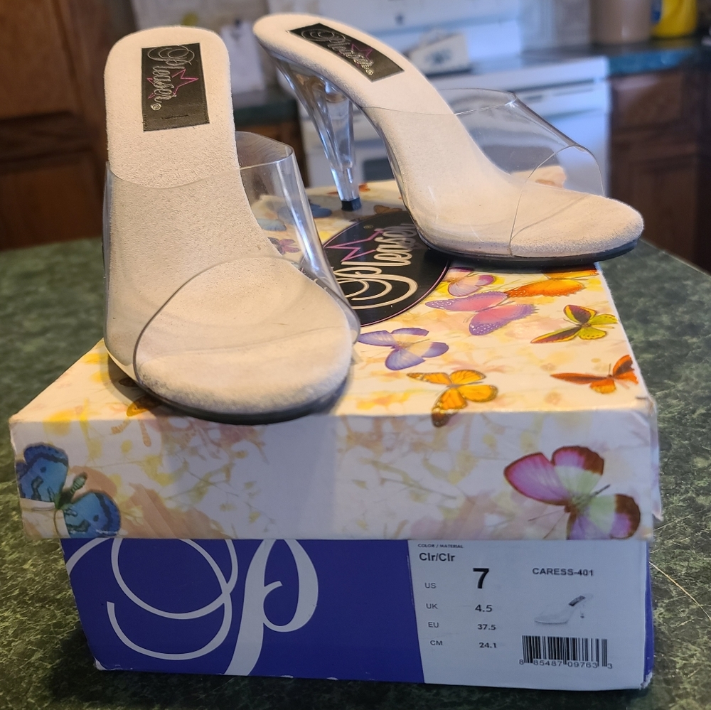 Clear high heels I call them my Barbie doll shoes